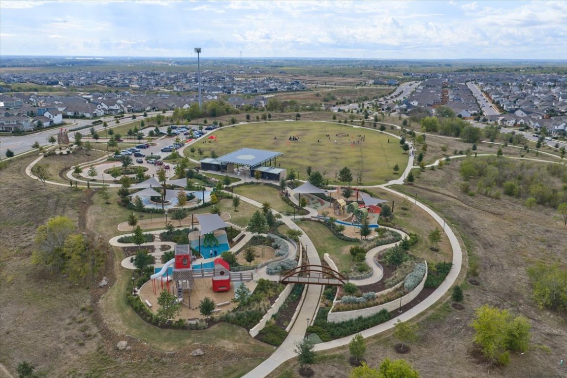 8700 Olmsted Way Austin, TX 78744 - Photo 40 of 40 Aerial view of residential area featuring a community park