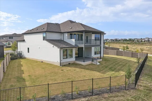 a view of a house with a swimming pool