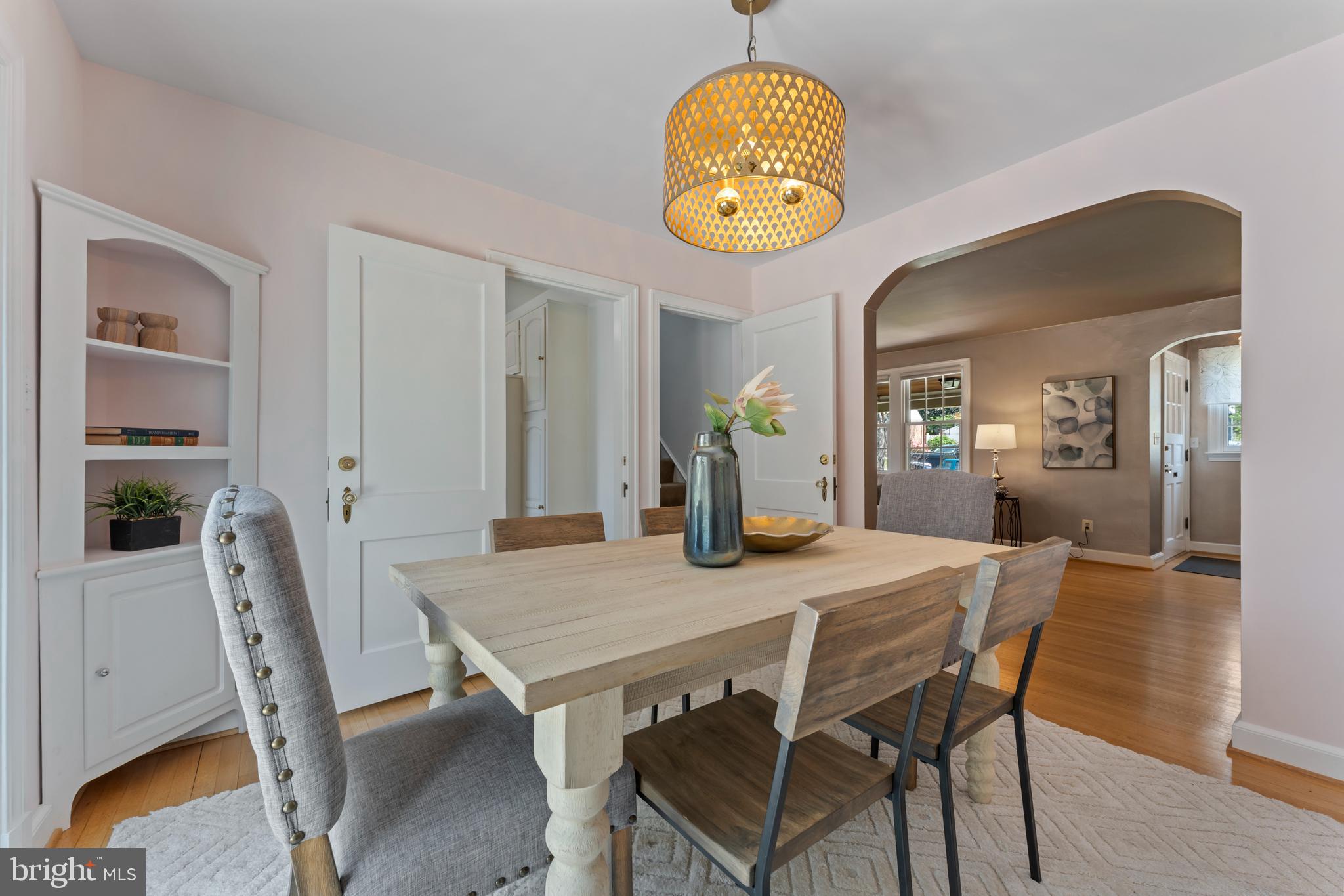9906 Rogart Road Silver Spring, MD 20901 - Photo 12 of 68 a view of a dining room and chandelier