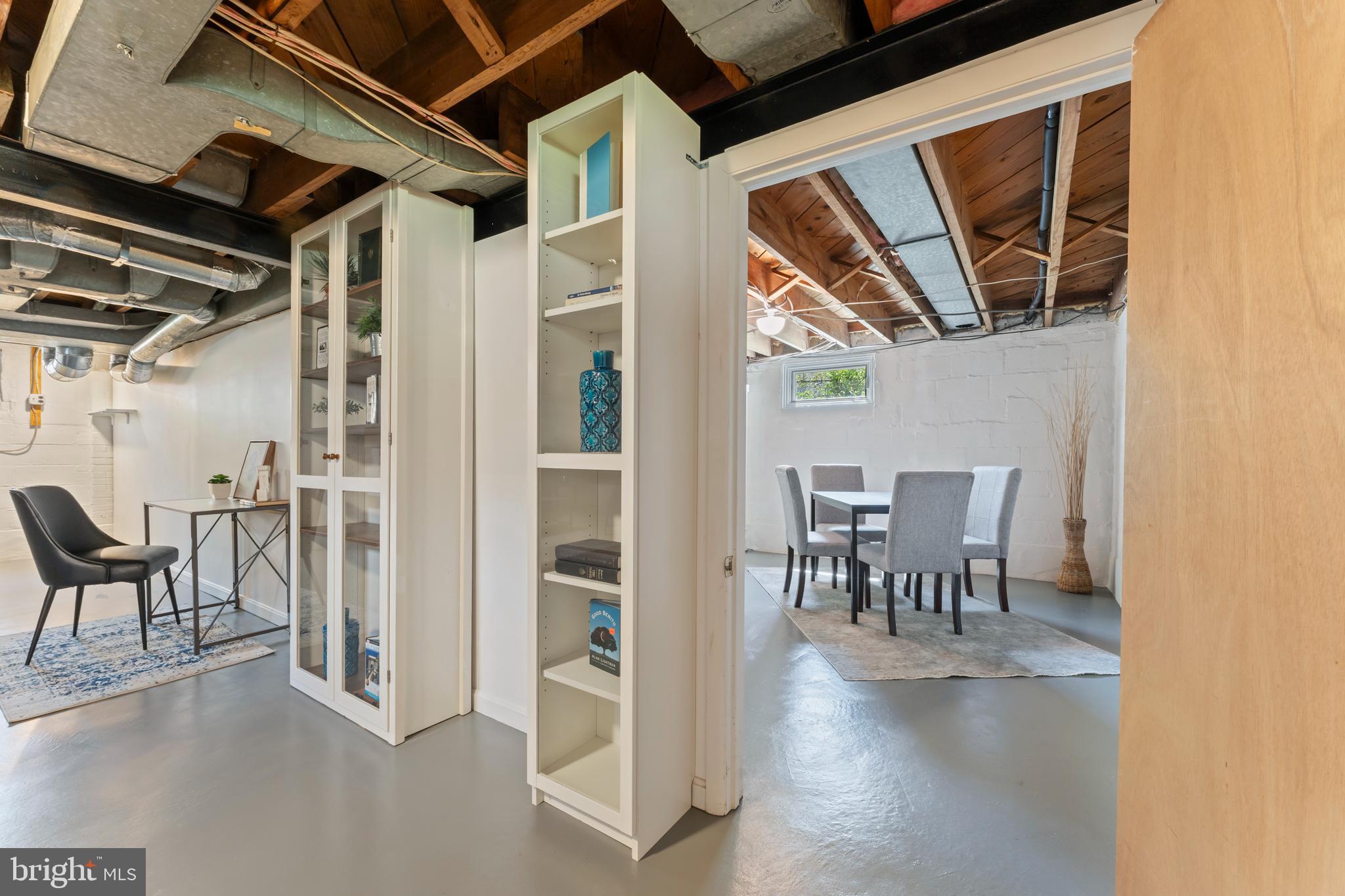 9906 Rogart Road Silver Spring, MD 20901 - Photo 49 of 68 a view of a livingroom with furniture and a window