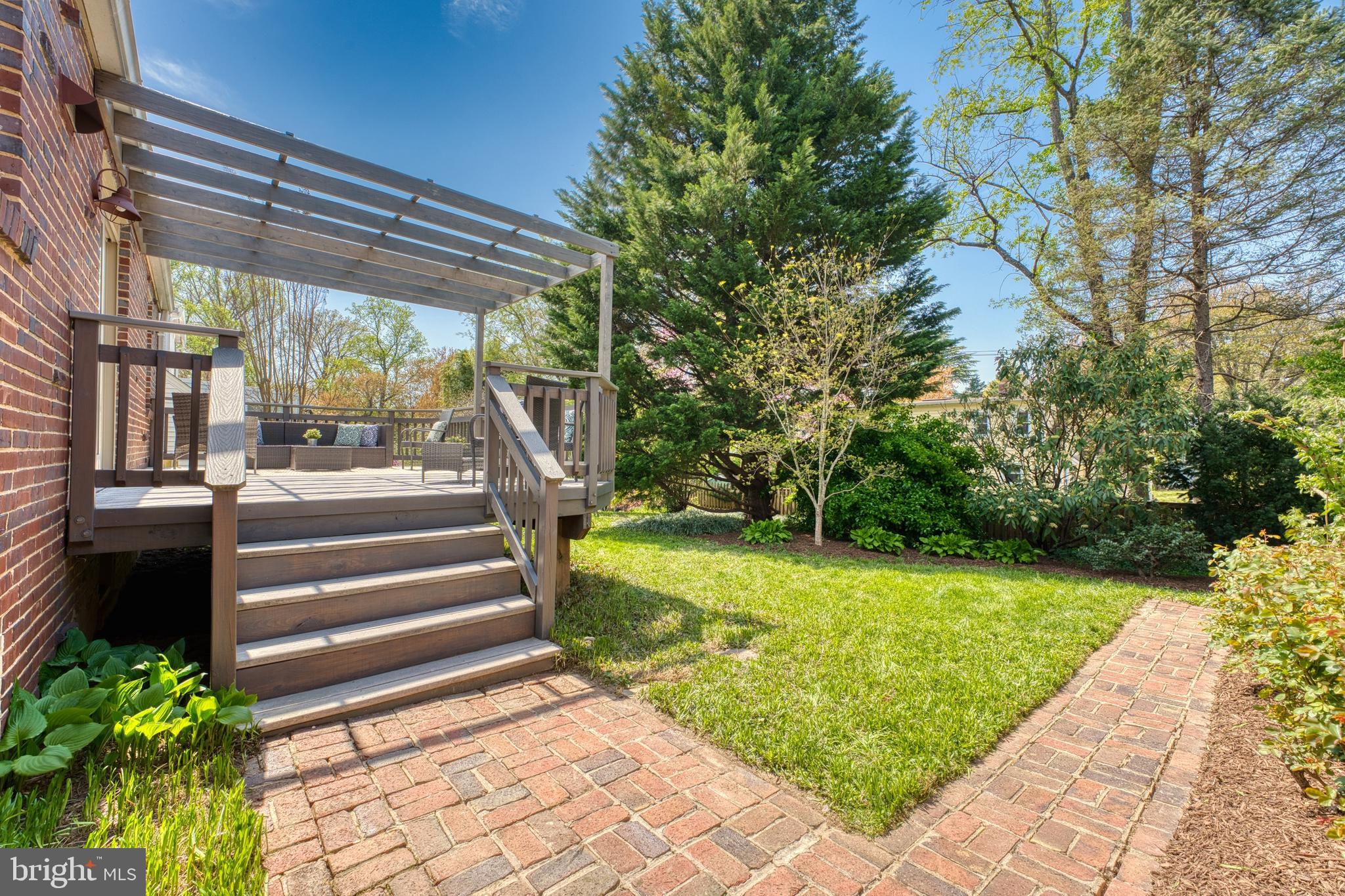9906 Rogart Road Silver Spring, MD 20901 - Photo 62 of 68 a view of a backyard with sitting area