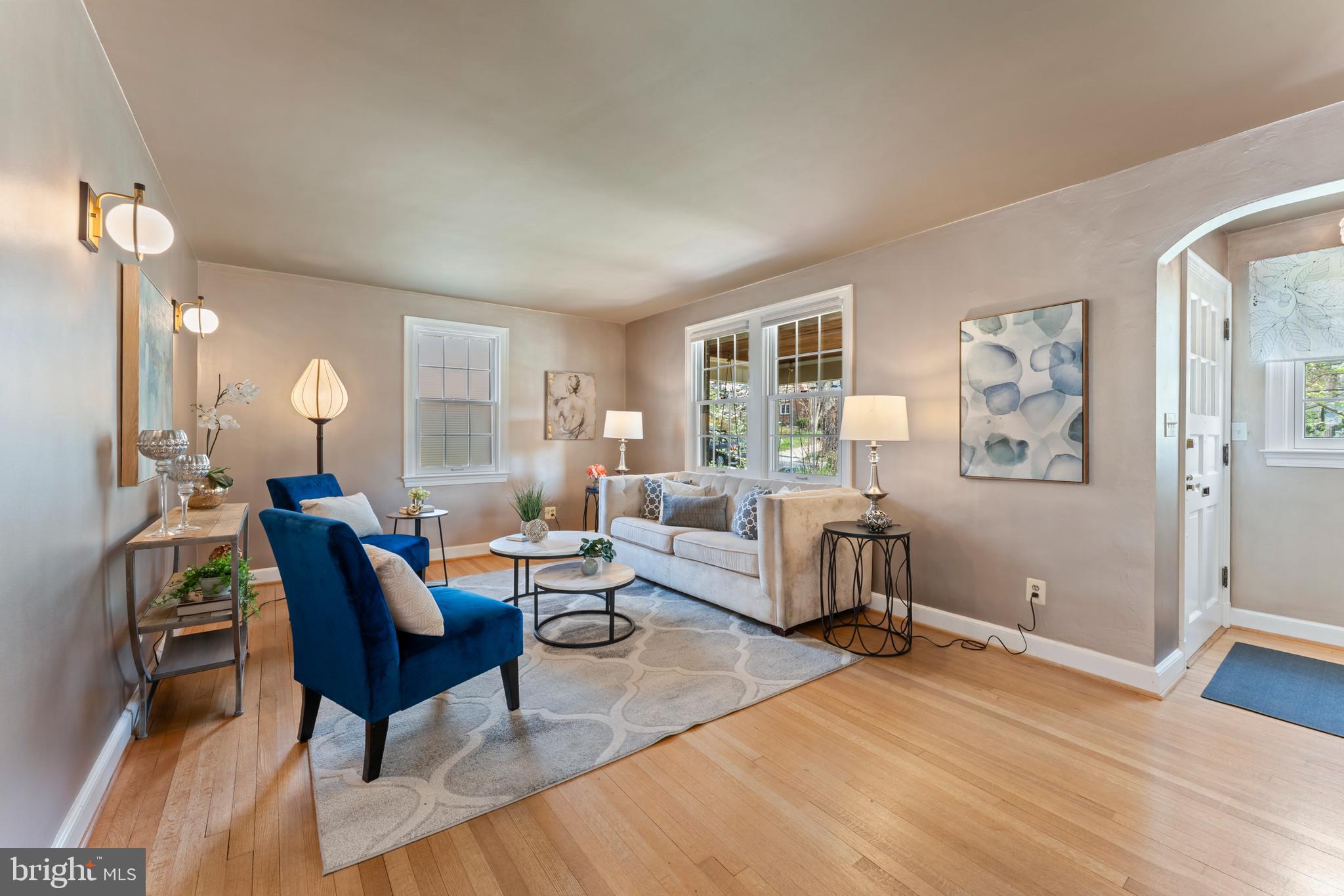 9906 Rogart Road Silver Spring, MD 20901 - Photo 8 of 68 a living room with furniture and a wooden floor