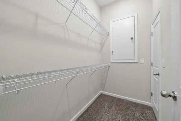 a view of a room with racks on the wall