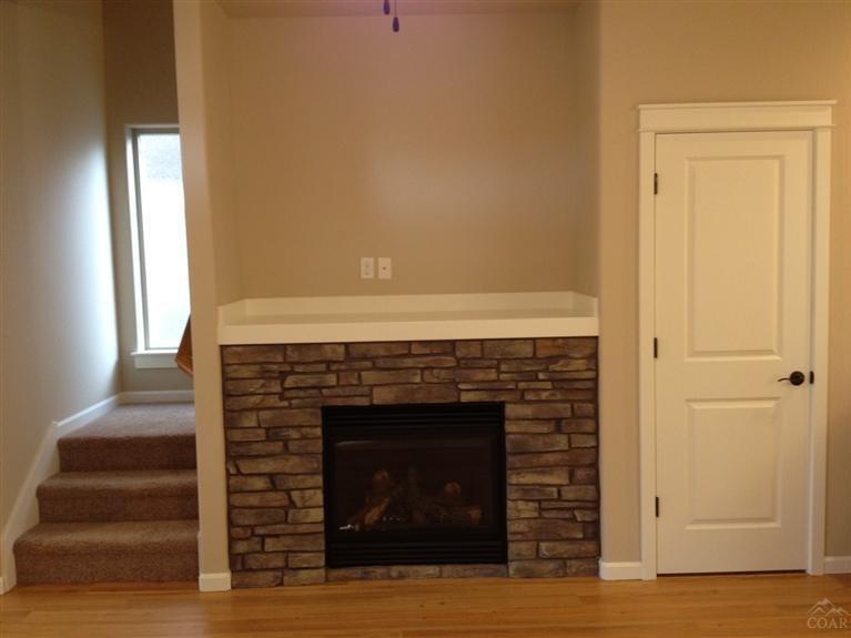 20803 Smoke Stack Lane, Unit 57 Bend, OR 97701 - Photo 6 of 19 Cozy gas fireplace for those chilly Bend