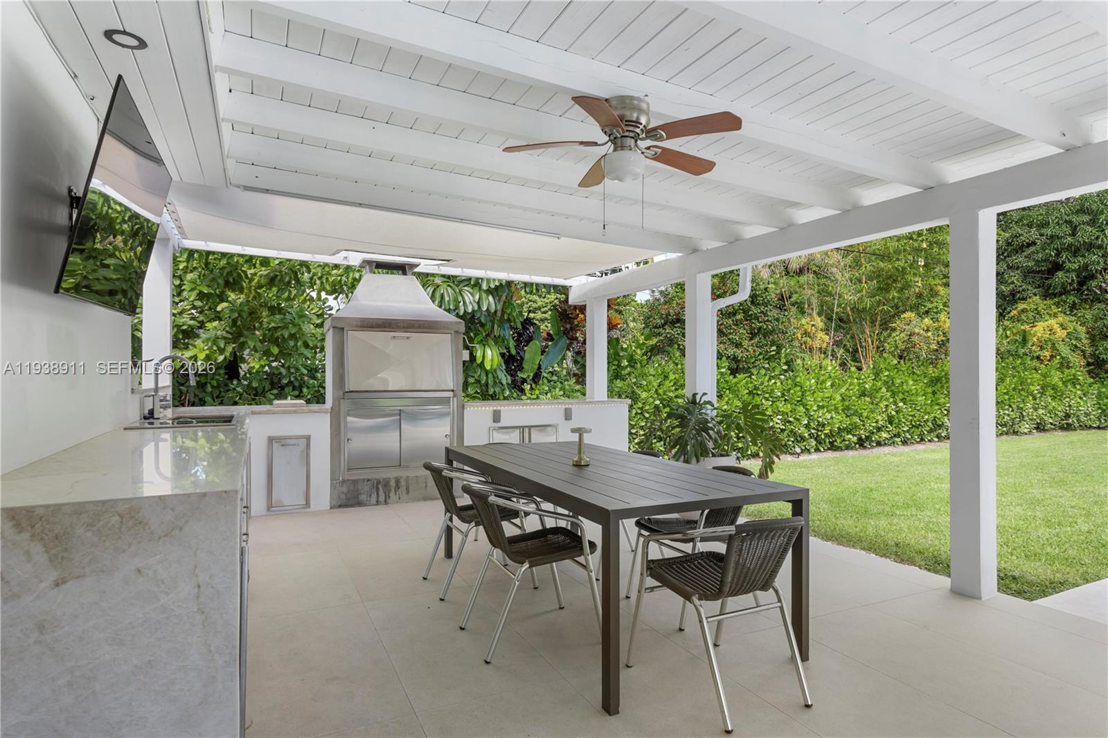 7825 Southwest 72nd Avenue Miami, FL 33143 - Photo 3 of 30 a view of a dining room with furniture window and outside view