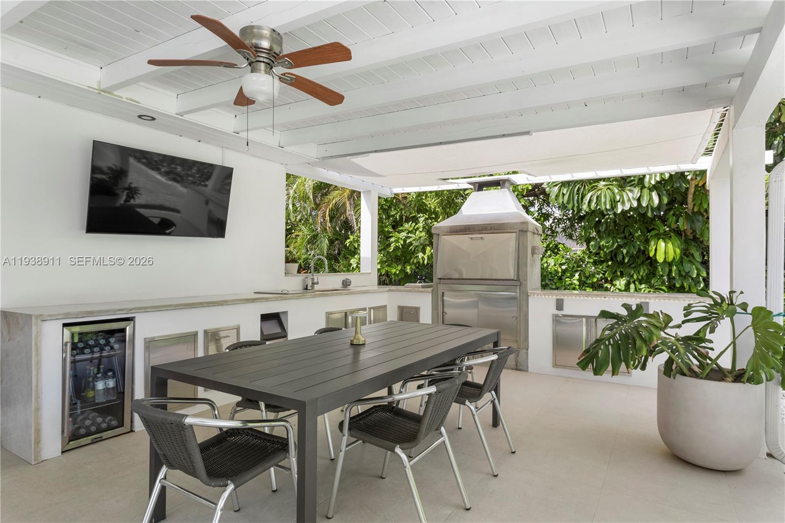 7825 Southwest 72nd Avenue Miami, FL 33143 - Photo 5 of 30 a view of a dining room with furniture window and outside view