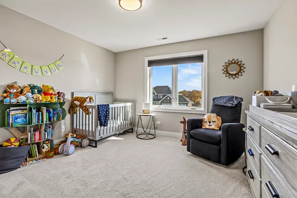 a bed room with furniture and a window