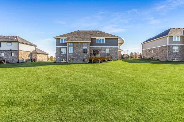a view of a house with a big yard