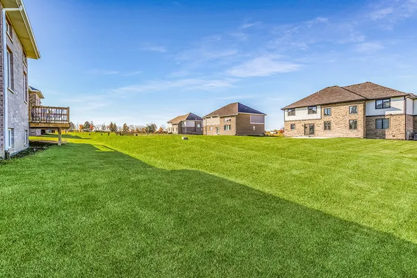 a view of a house with a big yard