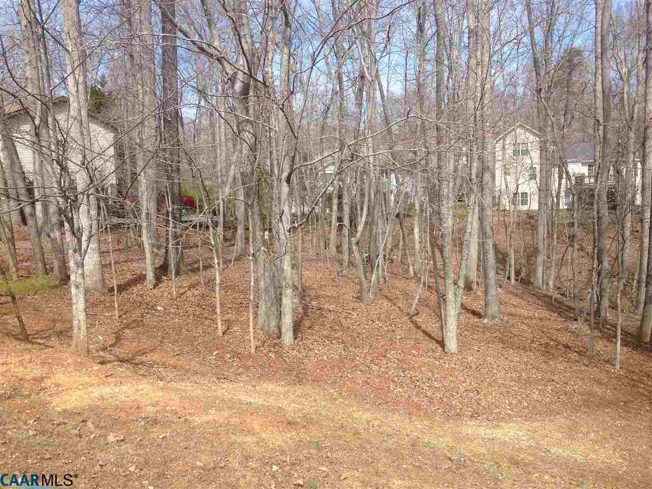 47 Amethyst Road Palmyra, VA 22963 - Photo 1 of 4 a view of an empty room with a wooden fence