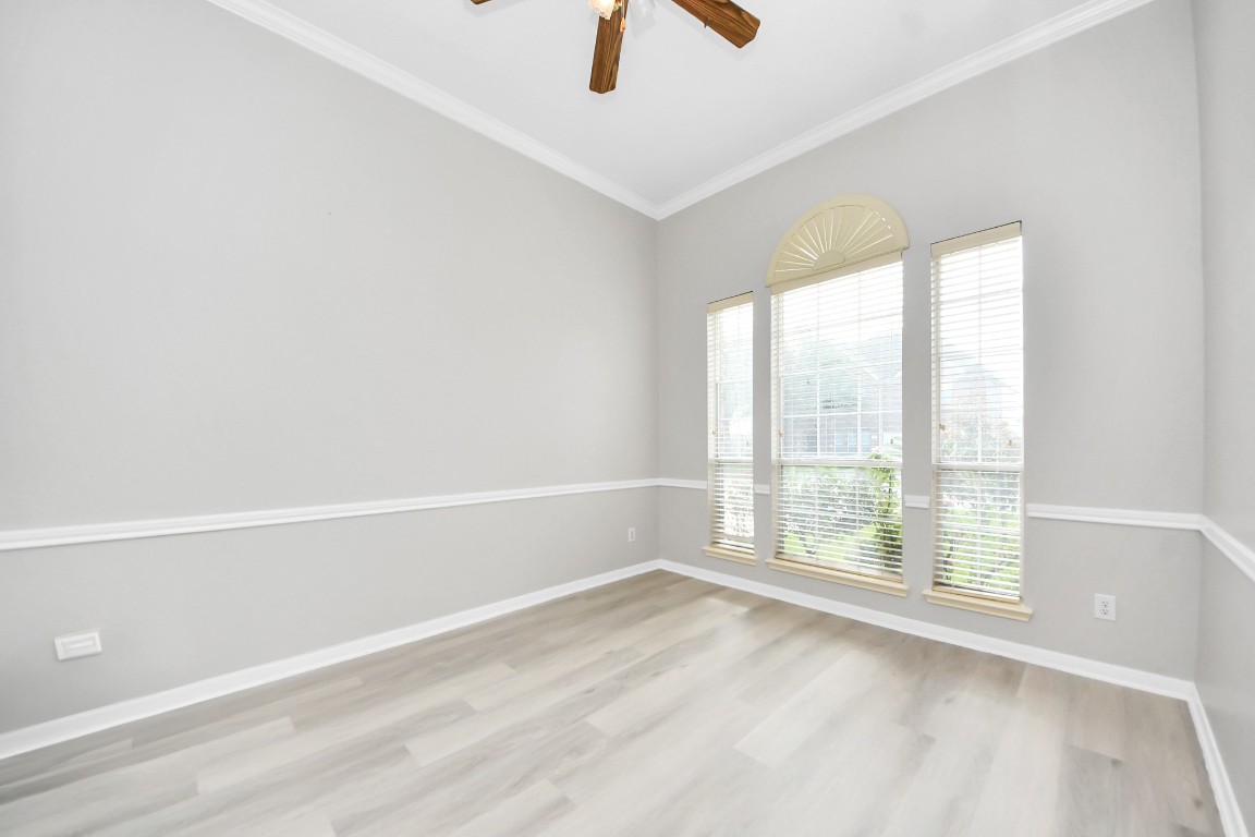 6803 Chapelfield Lane Houston, TX 77049 - Photo 13 of 50 an empty room with a window