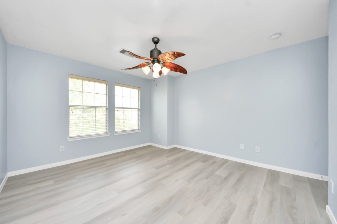 6803 Chapelfield Lane Houston, TX 77049 - Photo 32 of 50 a view of an empty room with a window