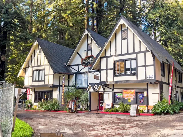a view of a patio with a table chairs and a patio