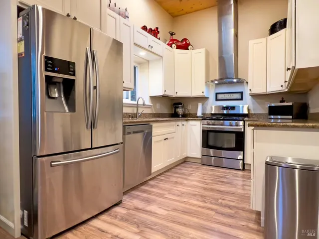a bedroom with a bed and a view of bathroom