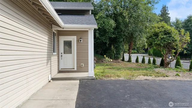 a house with trees in front of it