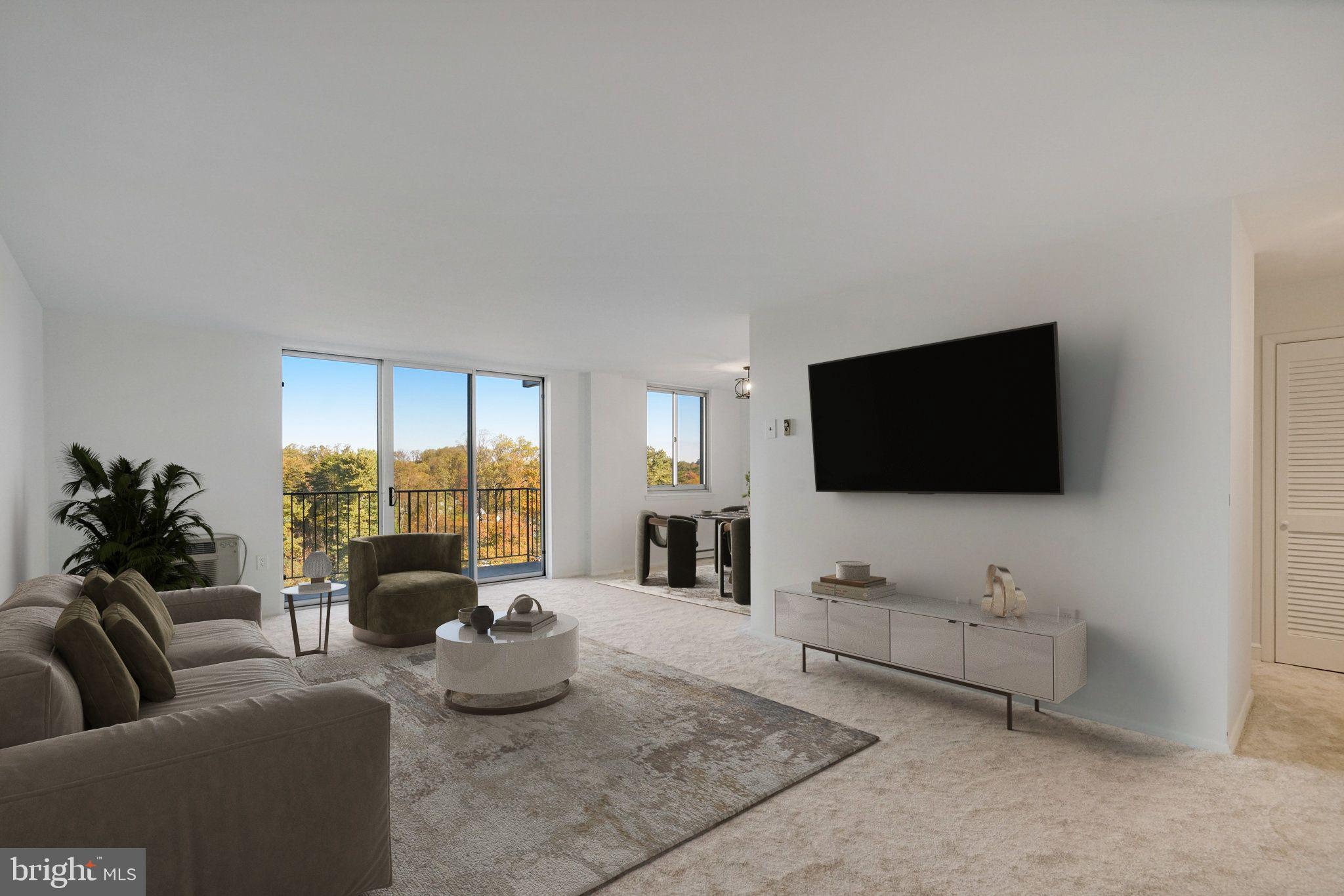 3245 Rio Drive, Unit 901 Falls Church, VA 22041 - Photo 1 of 38 a living room with furniture and a flat screen tv