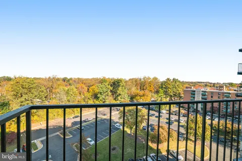 a view of a city skyline from a balcony