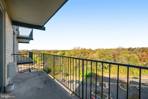 a view of a balcony with an ocean view