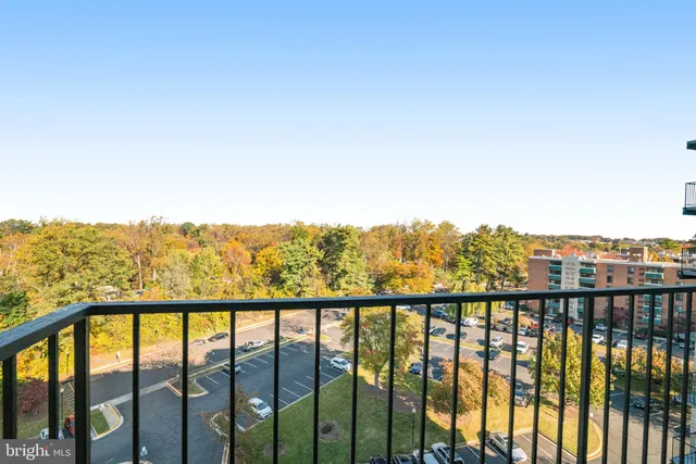 a view of a city skyline from a balcony