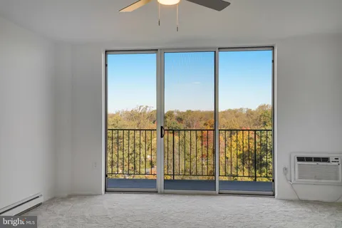a view of a room with a window