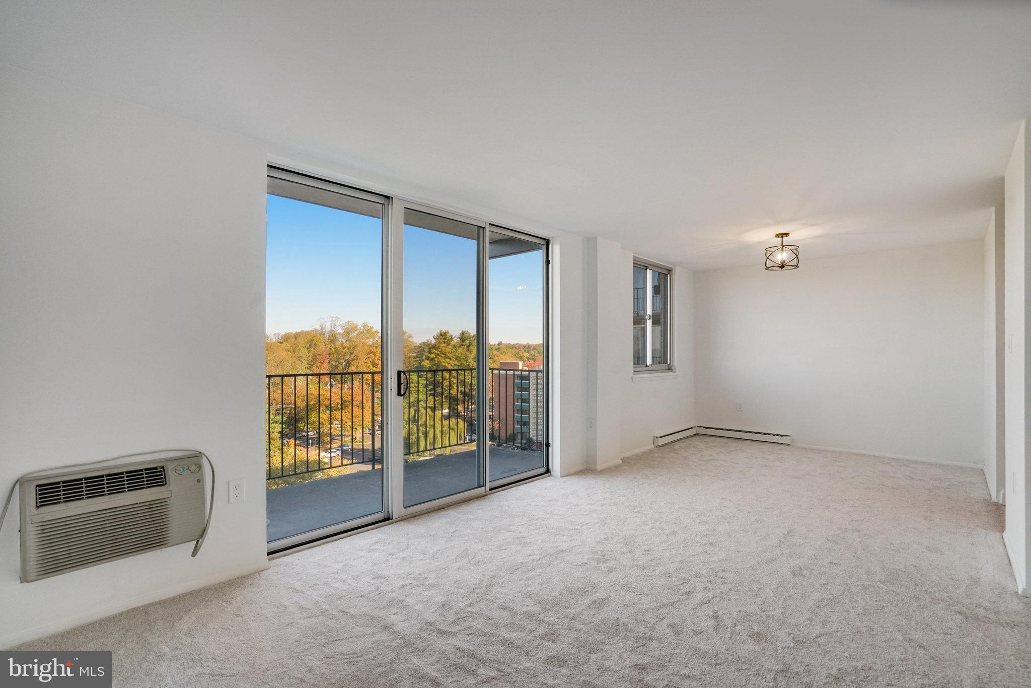 3245 Rio Drive, Unit 901 Falls Church, VA 22041 - Photo 4 of 38 an empty room with windows