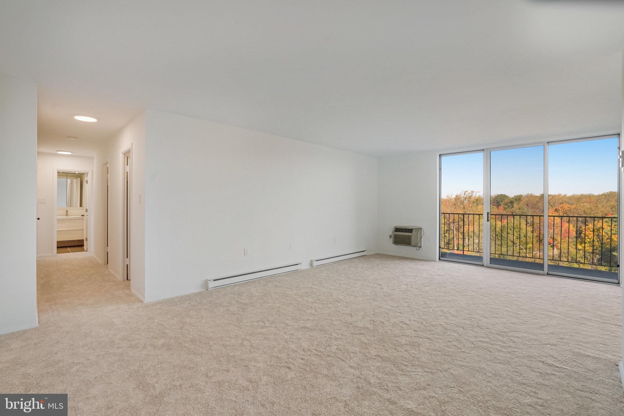 3245 Rio Drive, Unit 901 Falls Church, VA 22041 - Photo 6 of 38 a view of an empty room with a window