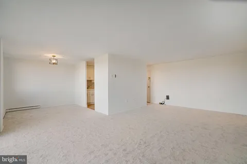 an empty room with an entryway
