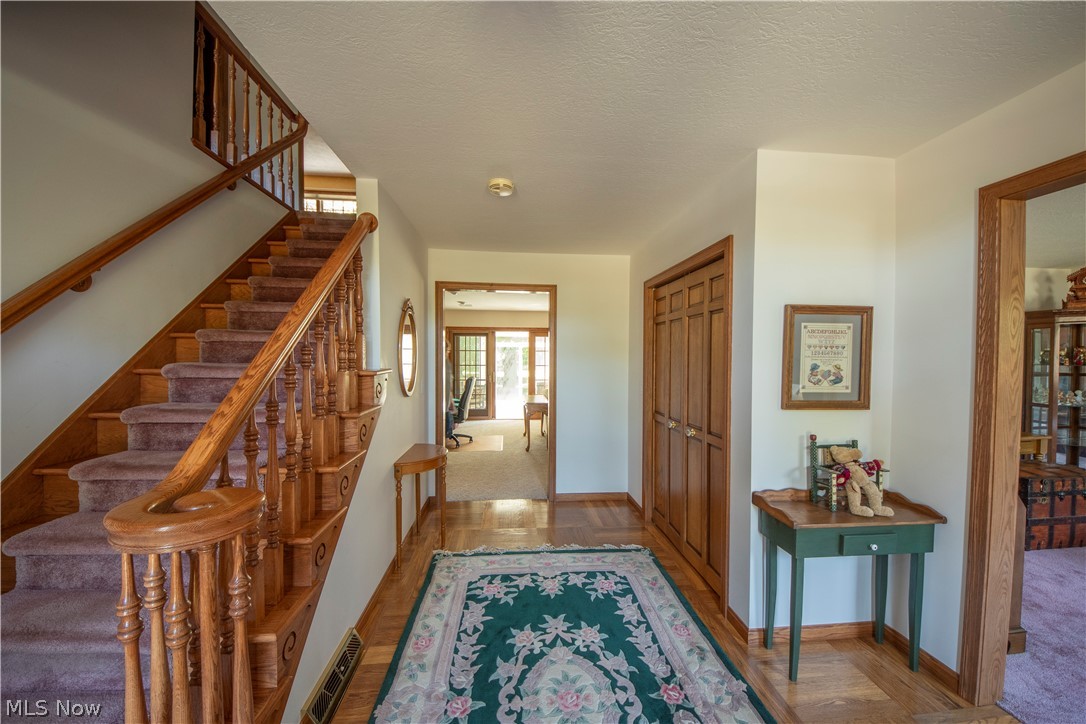 15210 Darrow Road Vermilion, OH 44089 - Photo 4 of 35 Foyer wood flooring.