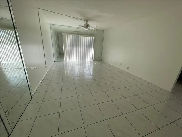 a view of a big room with wooden floor