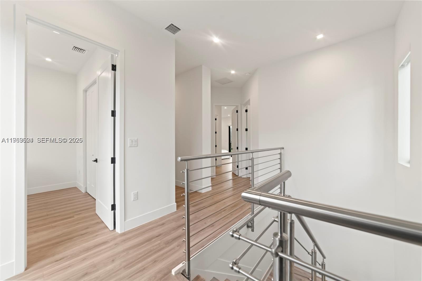 7771 Southwest 99th Street Miami, FL 33156 - Photo 27 of 33 a view of a room with wooden floor