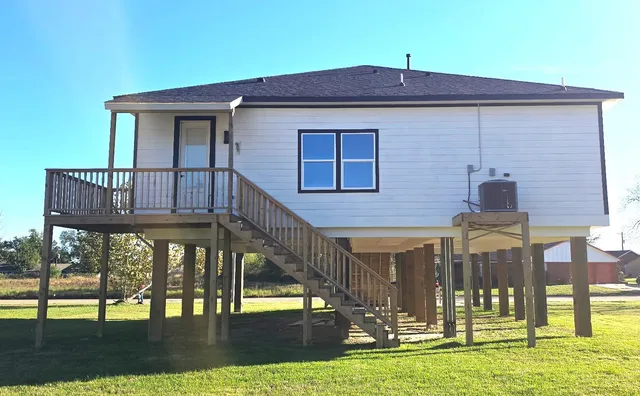 a front view of a house with swimming pool