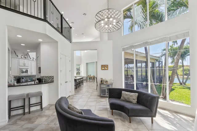 a living room with furniture and a table