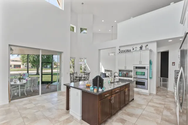 a bathroom with a toilet sink a shower and a mirror
