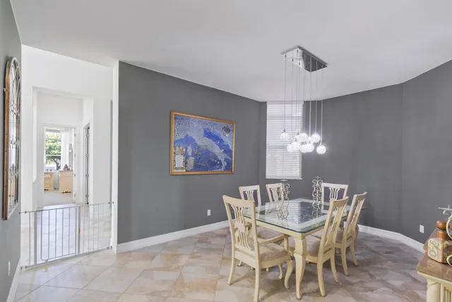 a view of a lake with houses in the back