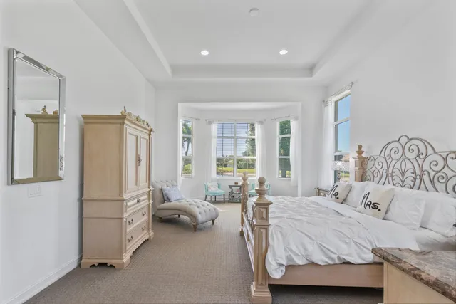 an aerial view of a house with a lake view