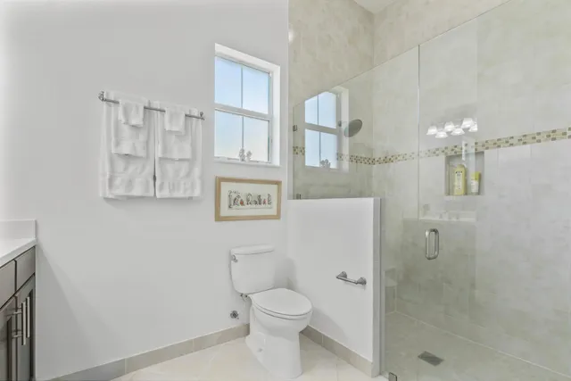 an aerial view of a house with a swimming pool