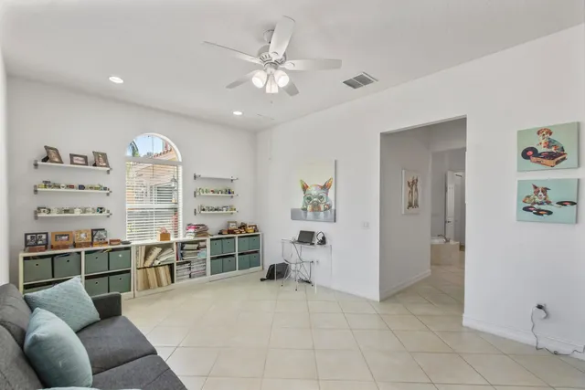 an aerial view of a house with garden space and swimming pool