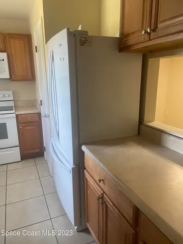 a view of a storage & utility room with washer and dryer