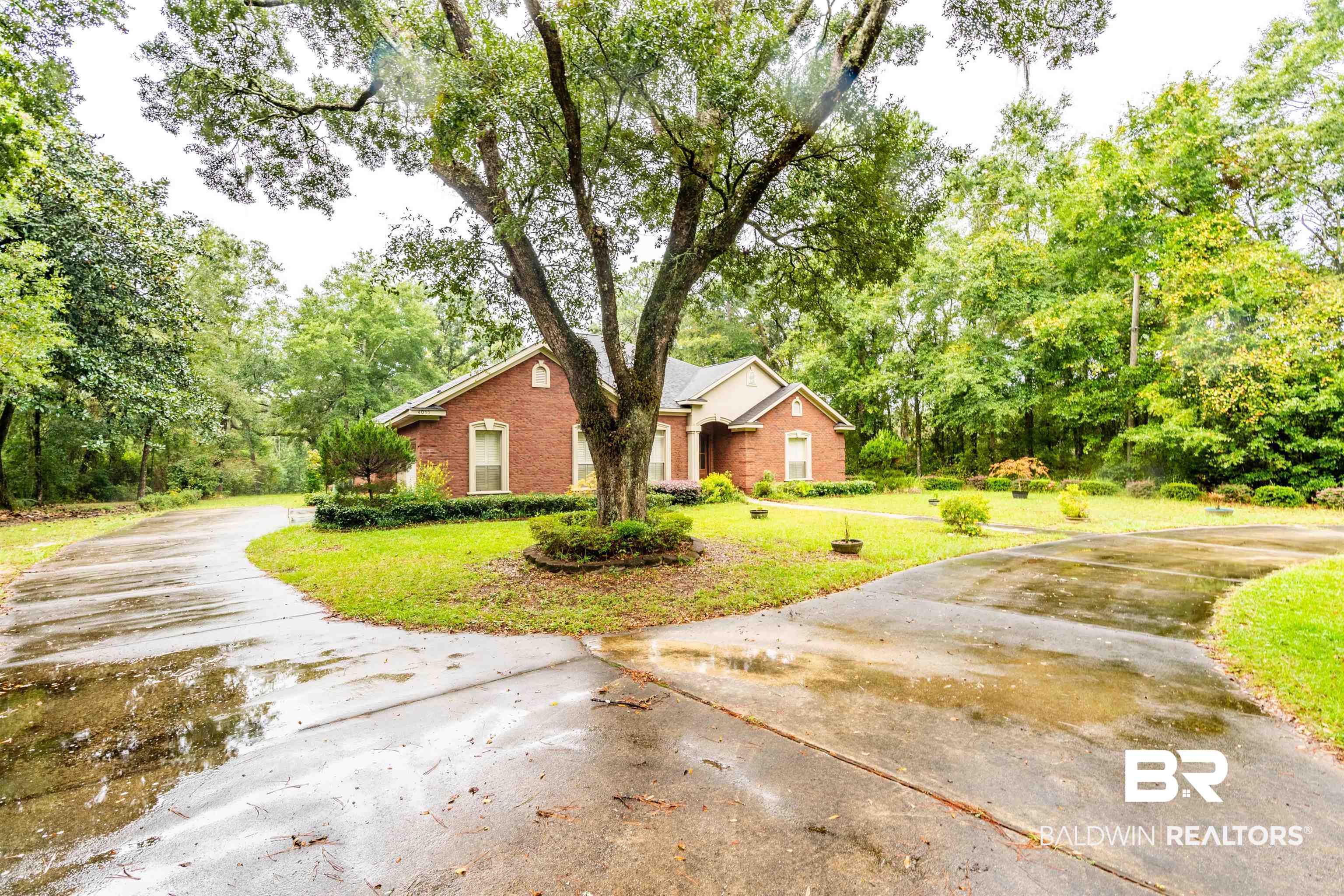 4055 Riviere Du Chien Road Mobile, AL 36693 - Photo 63 of 63 Exterior space featuring a front lawn