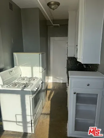 a utility room with washer and dryer