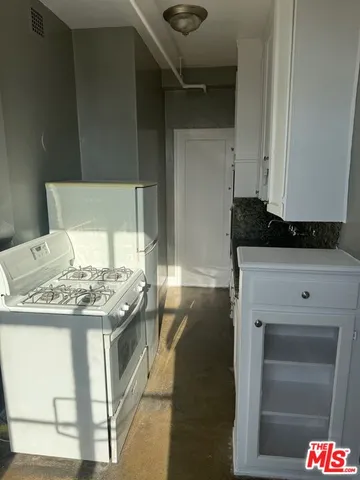 a utility room with washer and dryer