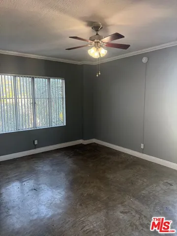 a kitchen with a stove and a refrigerator