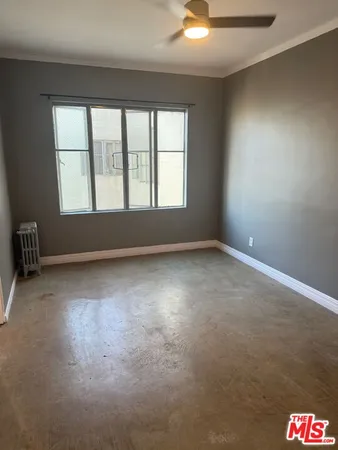 an empty room with window
