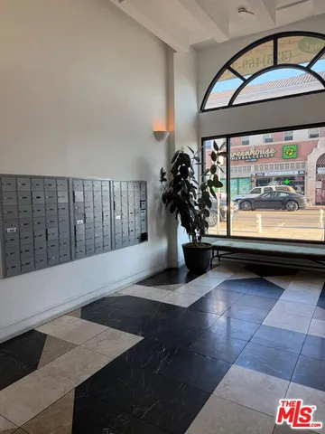 a kitchen with a stove and a refrigerator