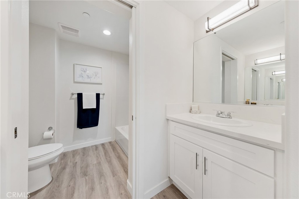 419 North Chandler Avenue, Unit 412 Monterey Park, CA 91754 - Photo 11 of 25 a bathroom with a sink a toilet and shower