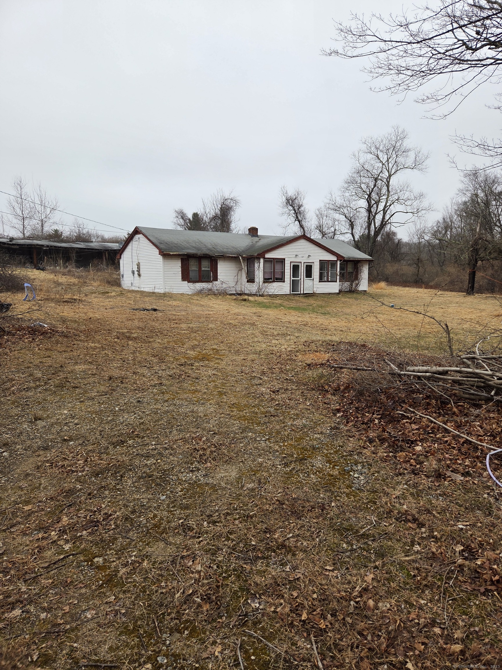 127 Highway 6 Columbia, CT 06237 - Photo 6 of 8 a front view of a house with a yard