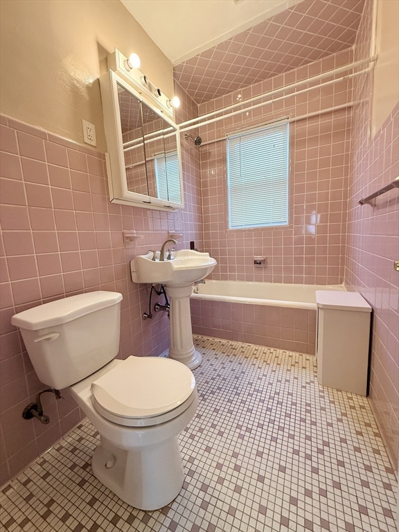 49 Favre Street, Unit 2 Boston, MA 02126 - Photo 20 of 22 a bathroom with a toilet a sink and a shower