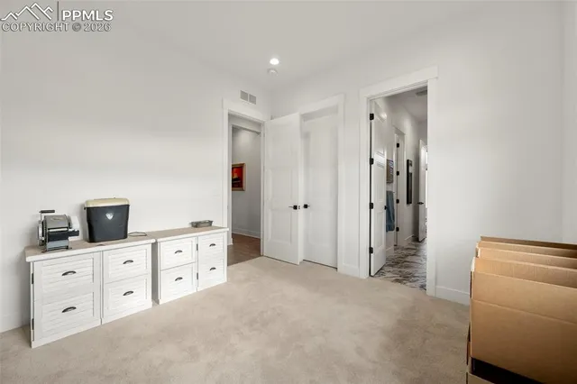 a view of workspace with cabinet