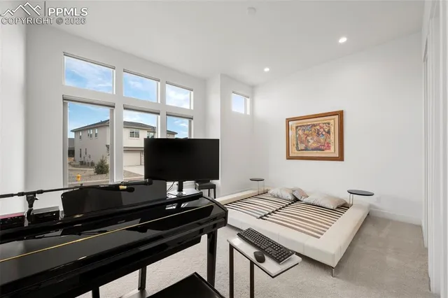 a room with furniture and a flat screen tv