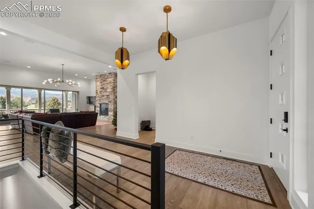 a view of dining room cabinets and wooden floor